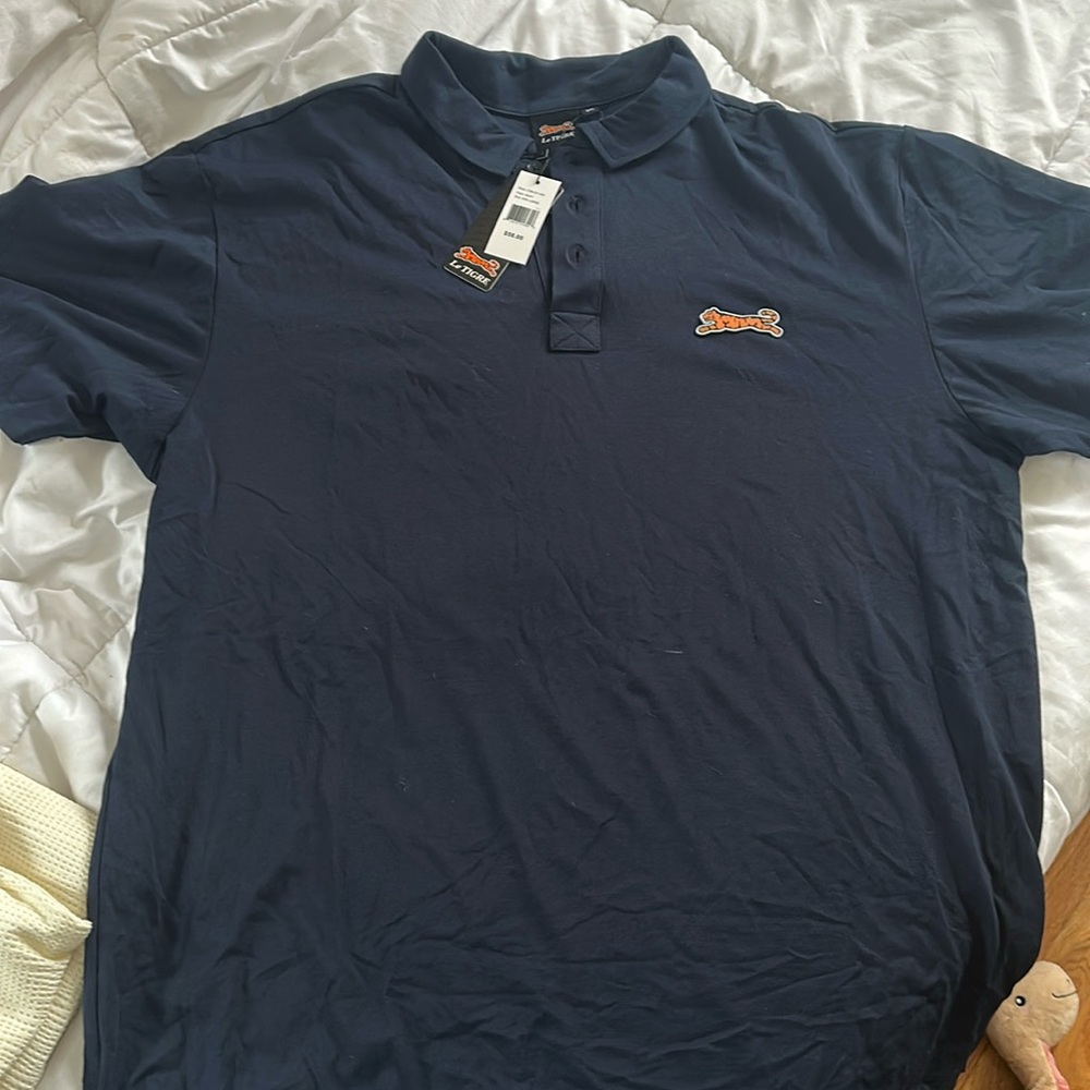Blue Le Tigre polo, 3XL. Brand new, with tags, never worn.